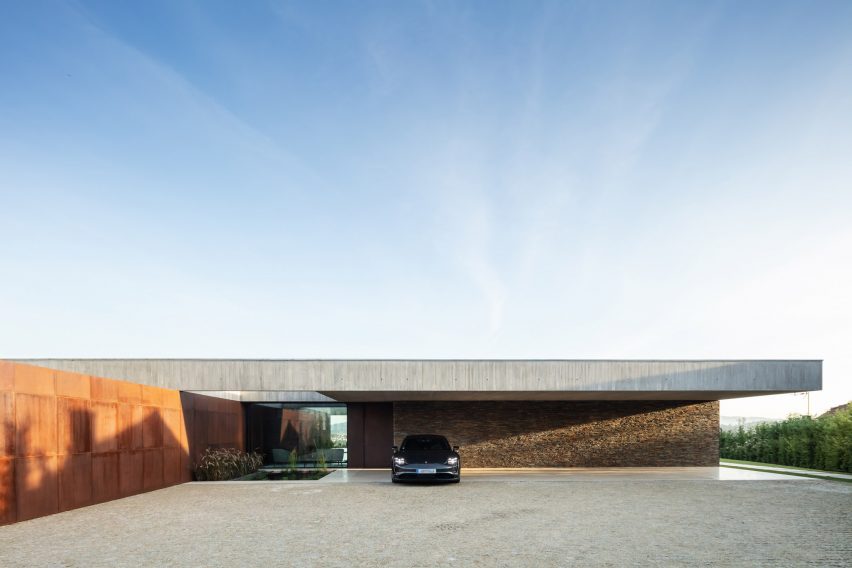 Front of concrete and Corten steel house in Braga