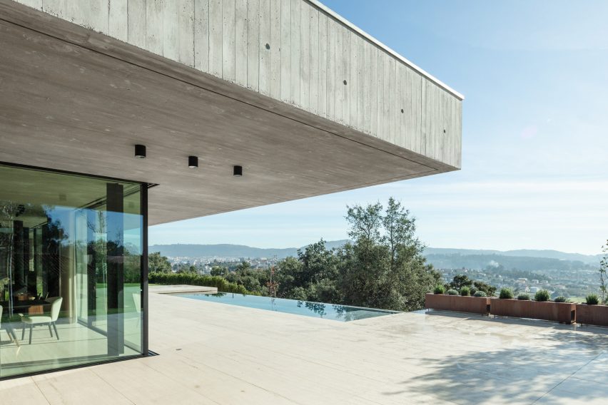 Concrete house with infinity pool