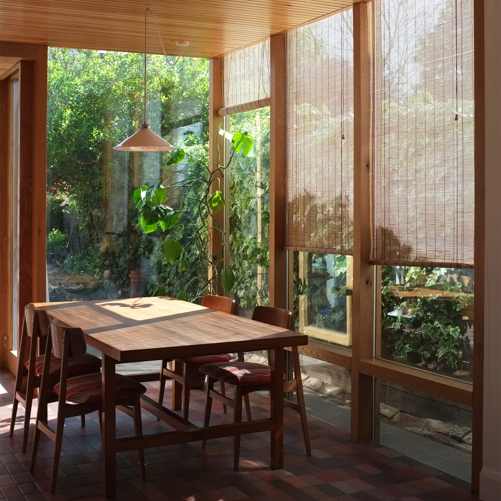 A wood-lined dining room in a London house