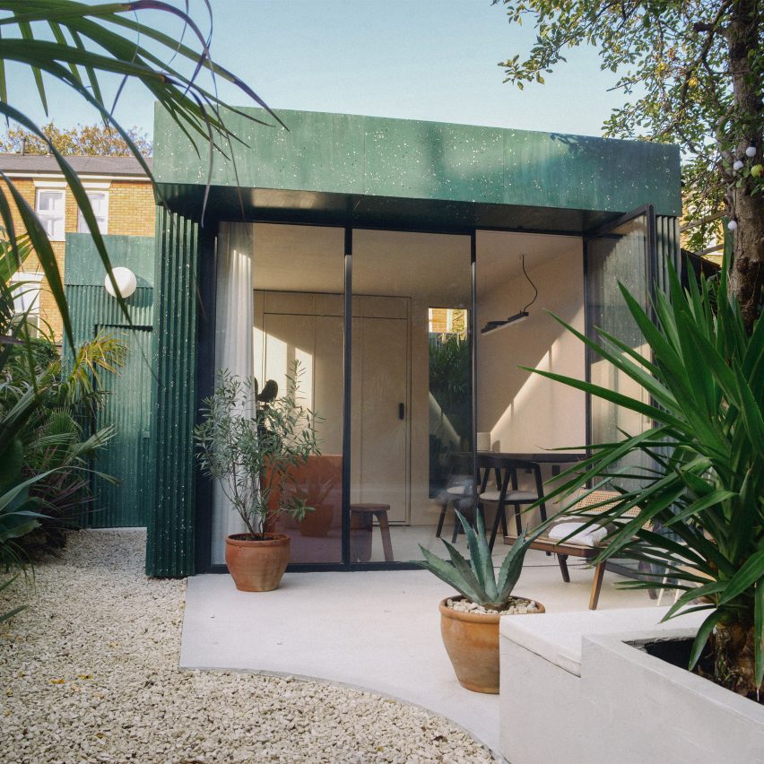 A garden studio clad in green terrazzo
