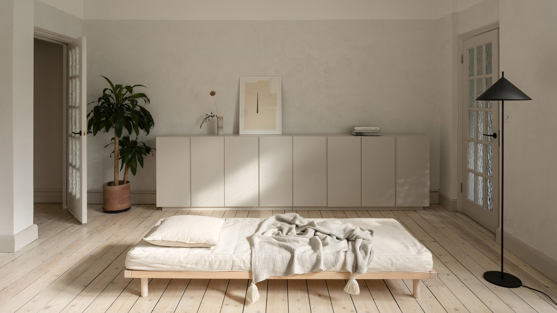 A minimalist bedroom inside a London flat