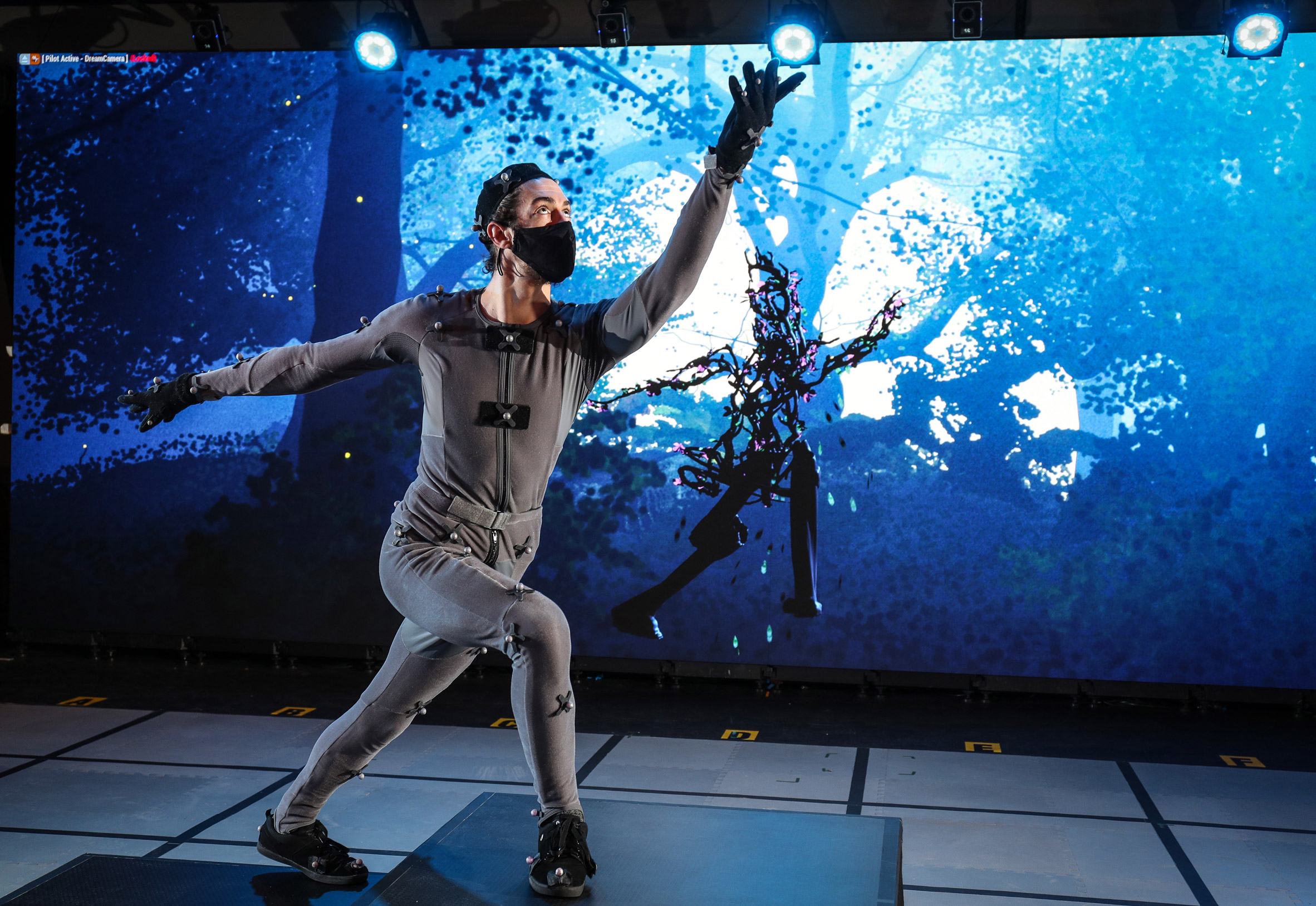 Performer in motion capture suit rehearsing for virtual Dream play