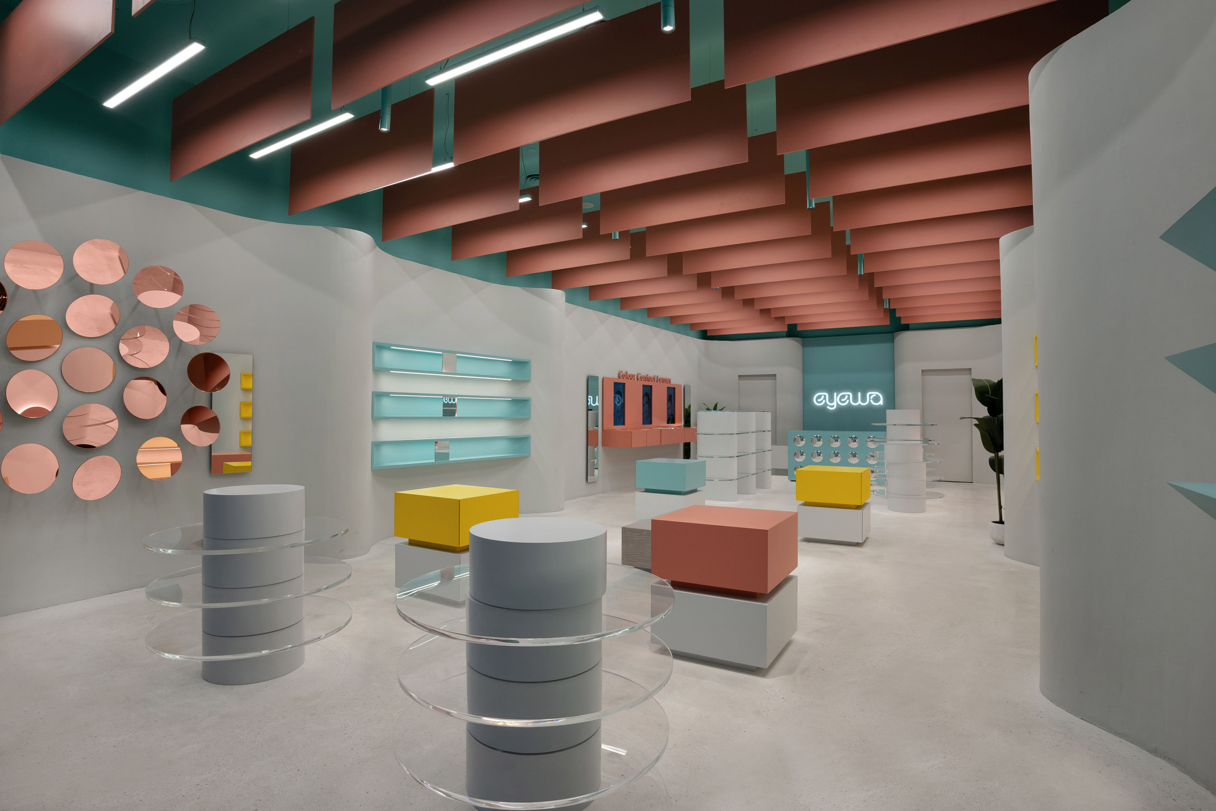 Cuboid and cylindrical display plinths in store design by Pierre Brocas and Nada Oudghiri