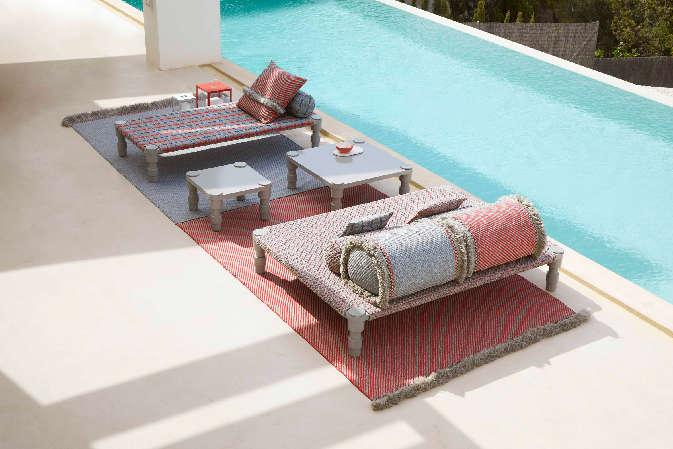 Collection by a pool by Patricia Urquiola