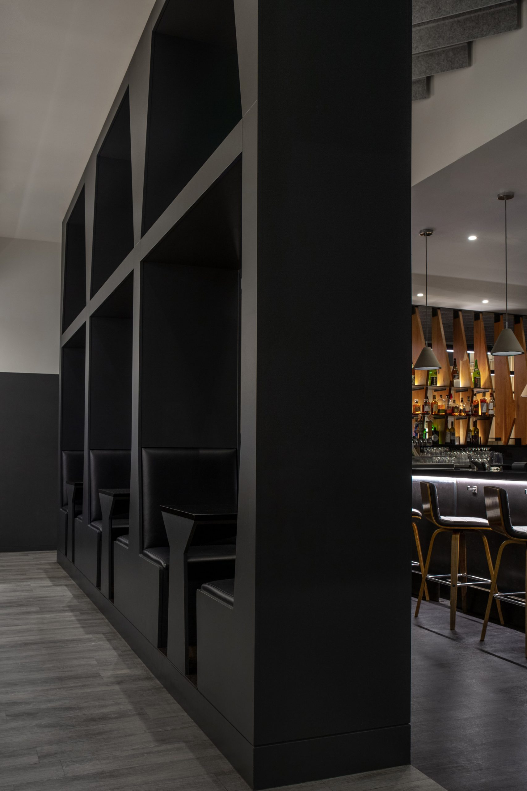 Booths of a restaurant by Roth Sheppard Architects
