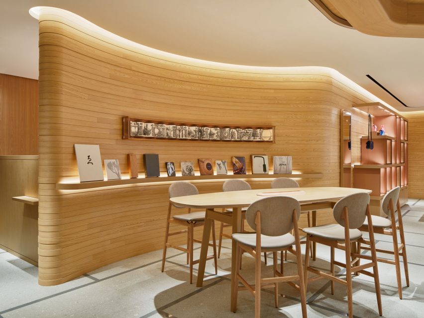 A shop interior with curved wooden walls