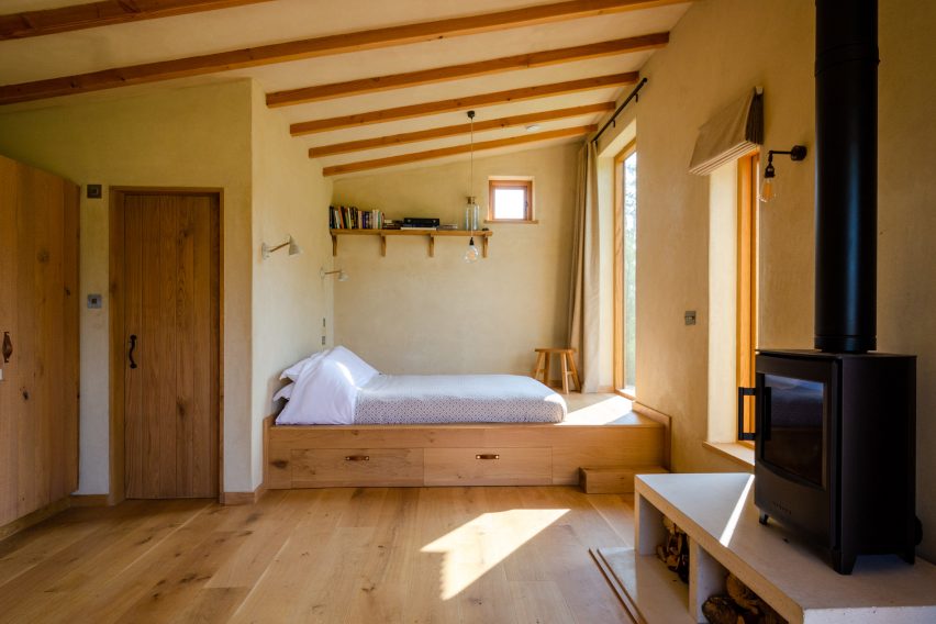 The pared-back interiors of a wooden cabin in Devon