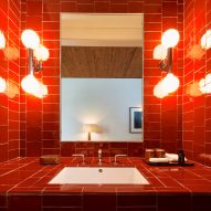 A red tiled bathroom