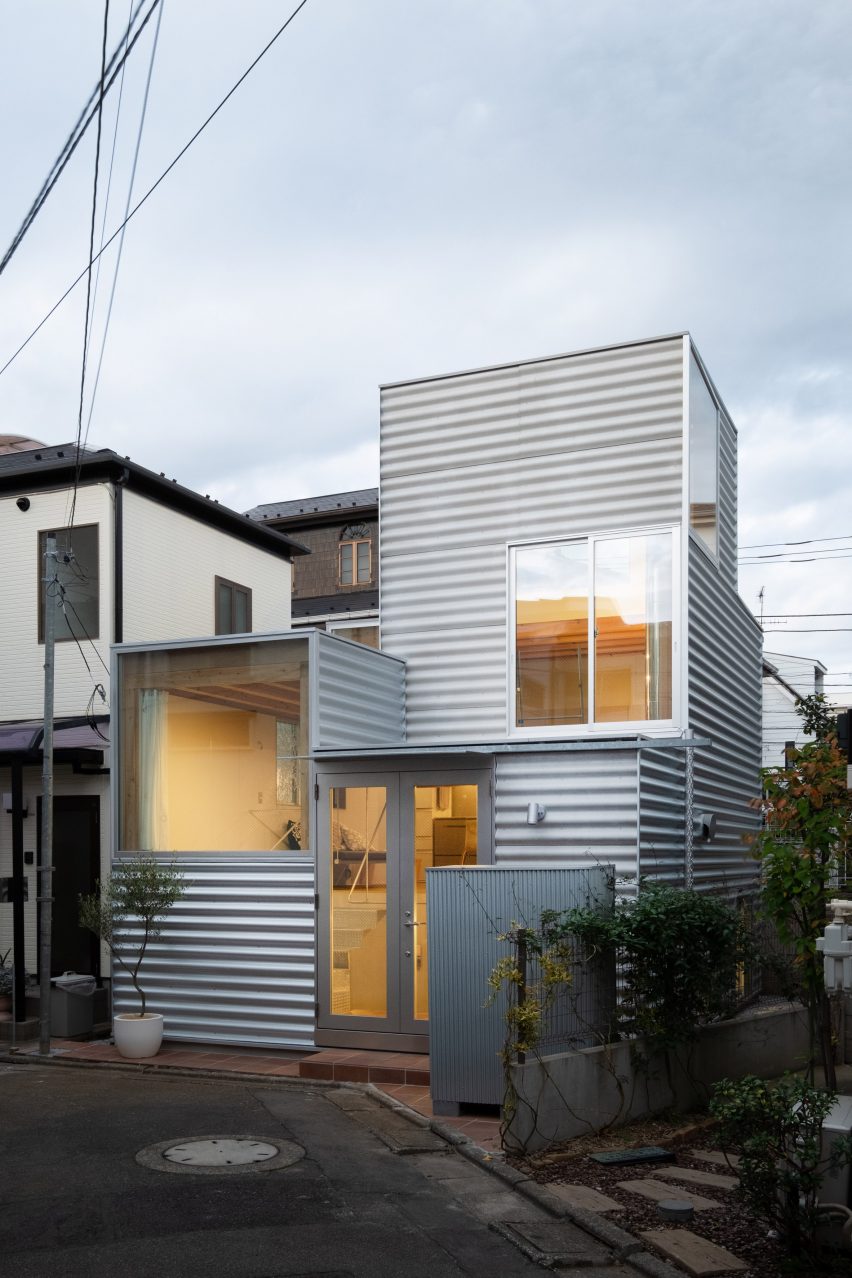 Stacked-box house with iron-clad facade