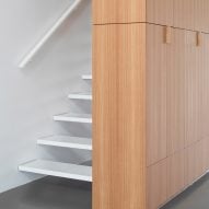 Stairs and shelving in Home for the arts by i29