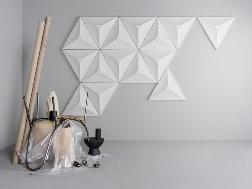A group of white geometric acoustic panels 