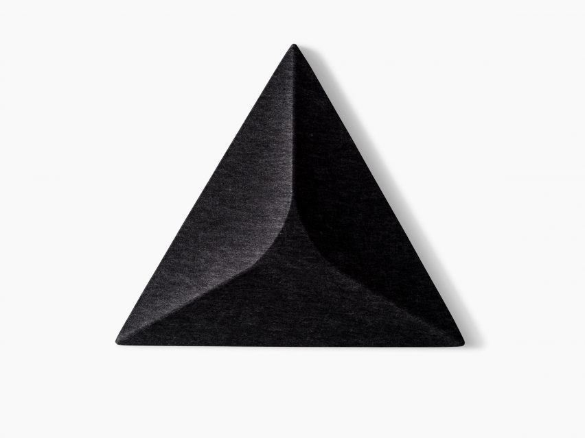 A triangular acoustic panel in black