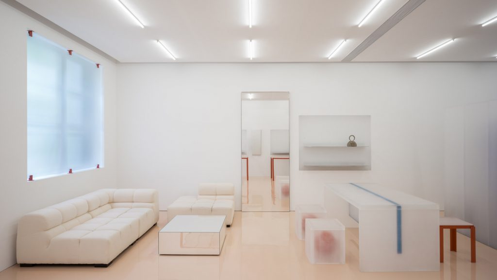 Say Architects uses frosted resin panels to create translucent boutique interior