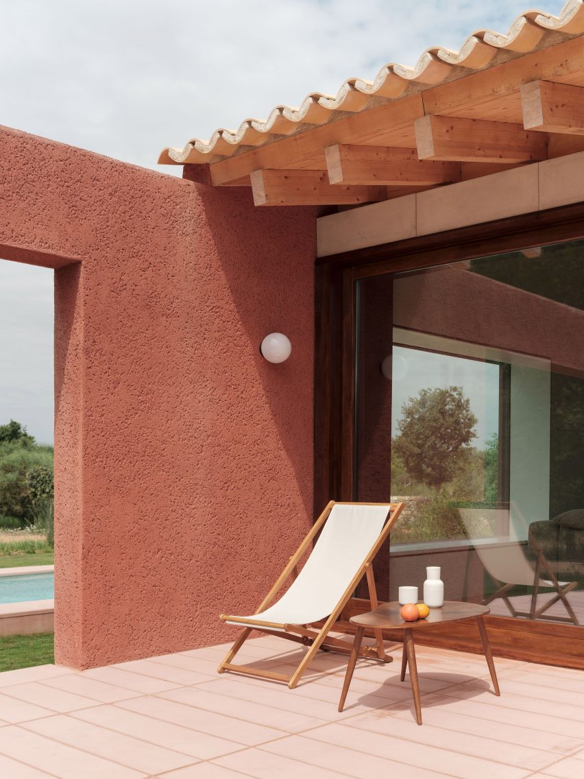 A tiled terrace outside a holiday home in Mallorca