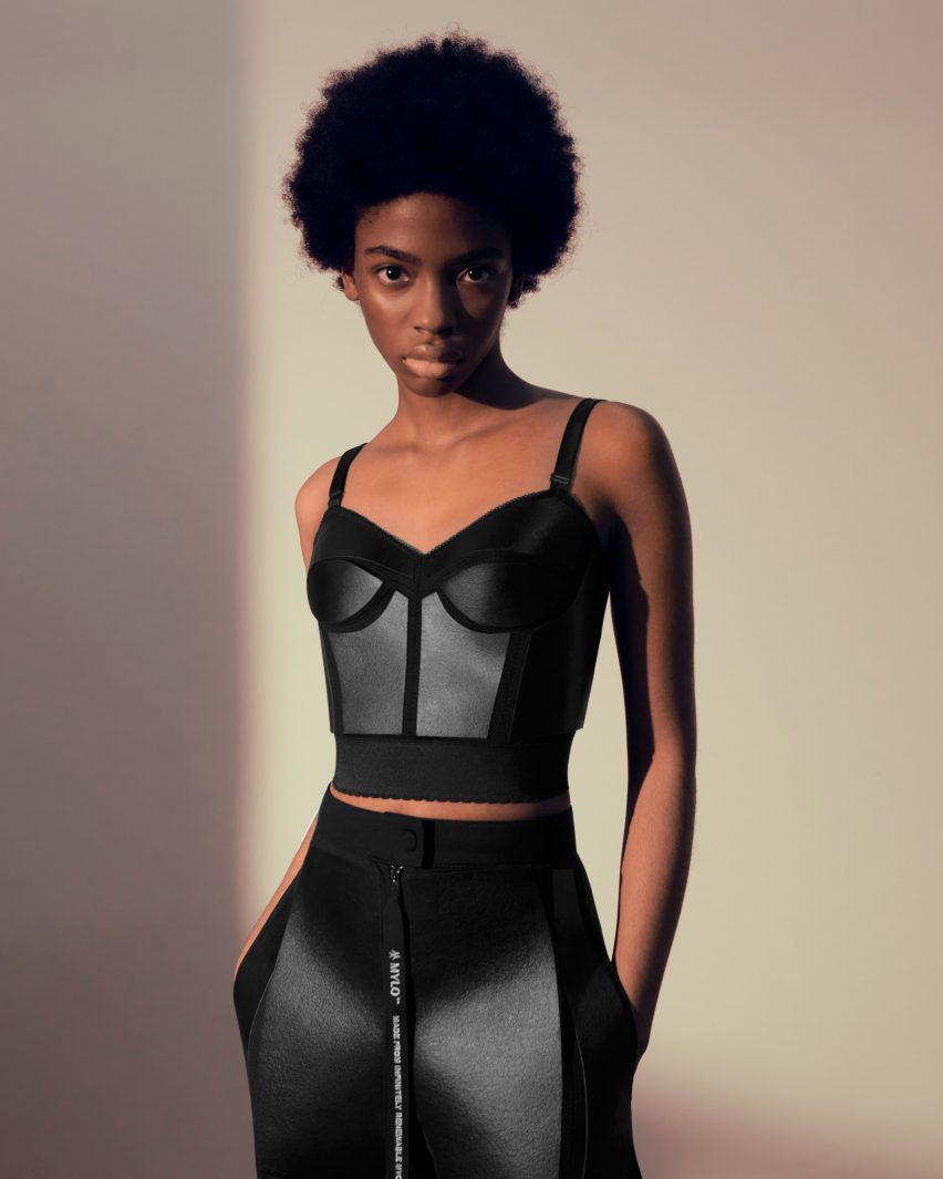 Model wearing black two-piece created by Stella McCartney from Mylo mycelium leather