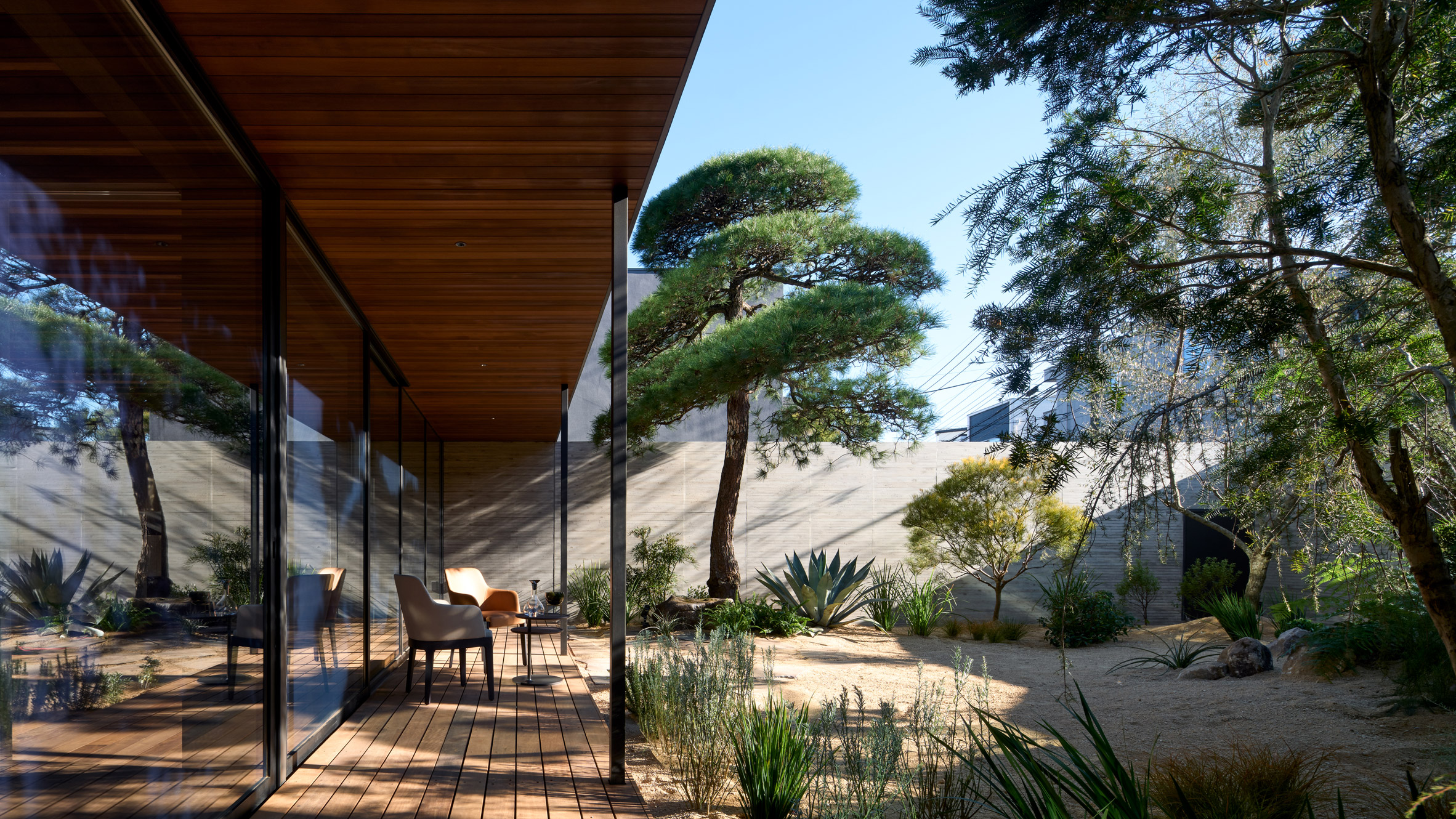 Apollo Architects & Associates creates multi-generational home with  walled-in garden