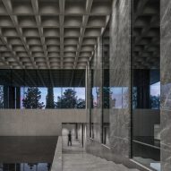 An office entrance with a waffle slab ceiling