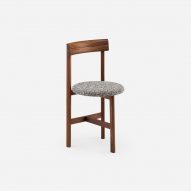 Dark wood chair with grey speckled seat