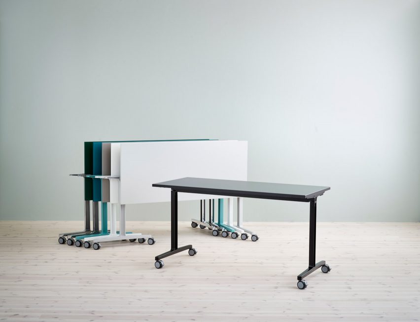 Folded and stacked tables by Flokk