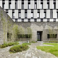 Neri&Hu contrasts tactile brick podium with minimalist office blocks at Schindler campus