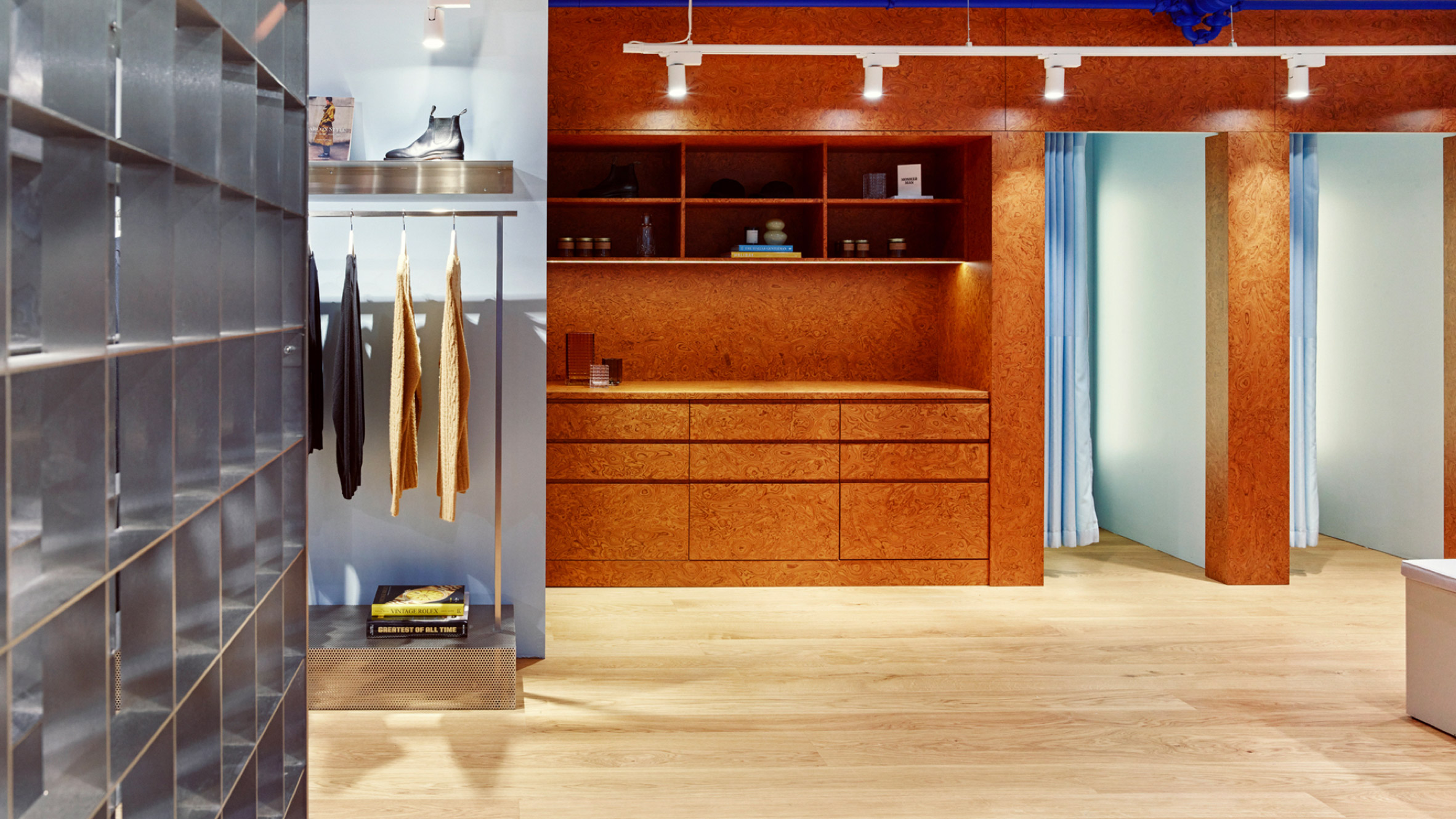 Burl wood joinery in an Oslo store interior designed by Snøhetta