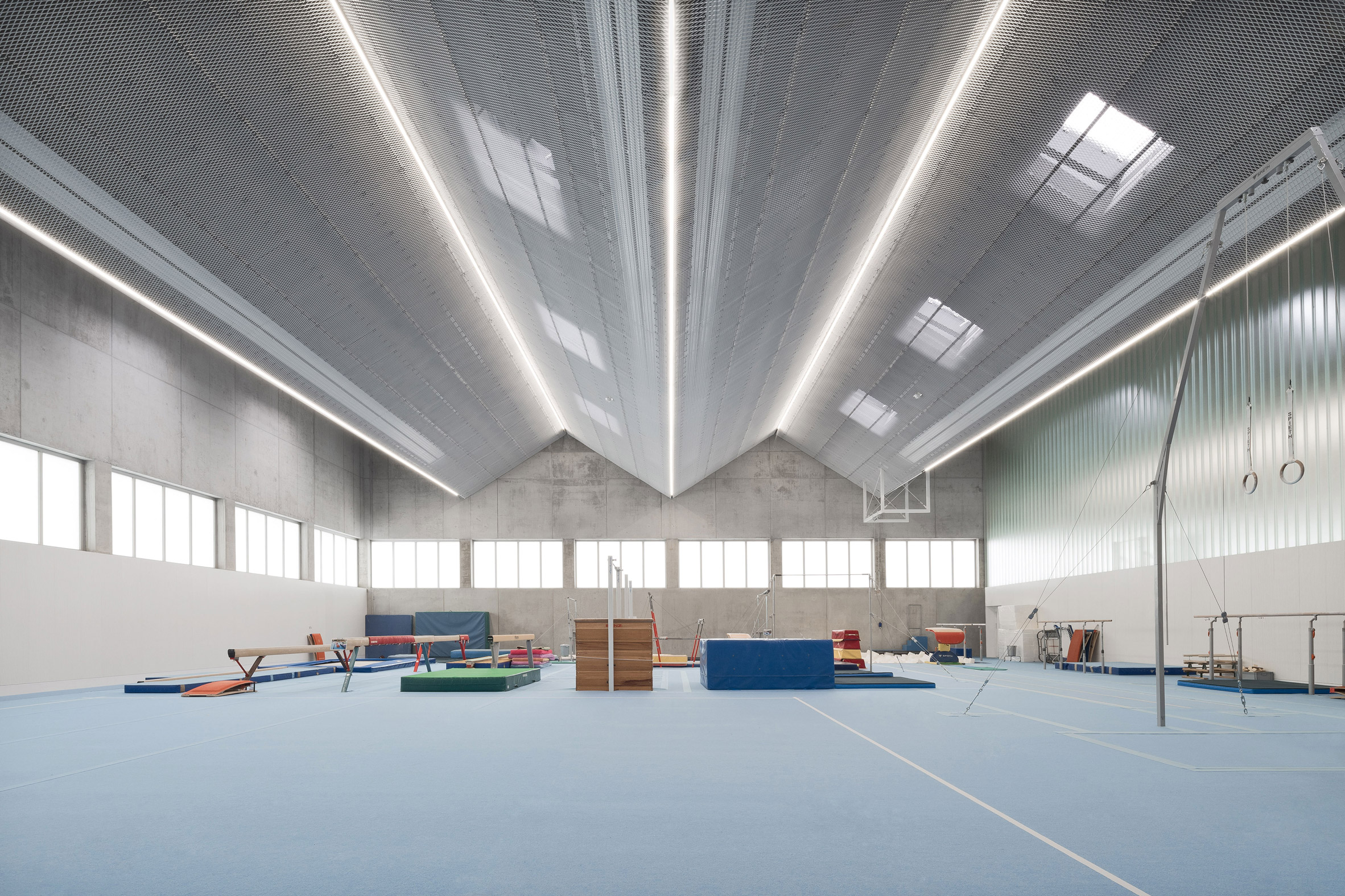 Large gymnasium with a blue floor
