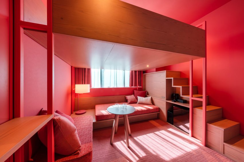 A pink hotel bedroom interior