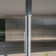 The polished-aluminium exterior of Villa Fifty-Fifty