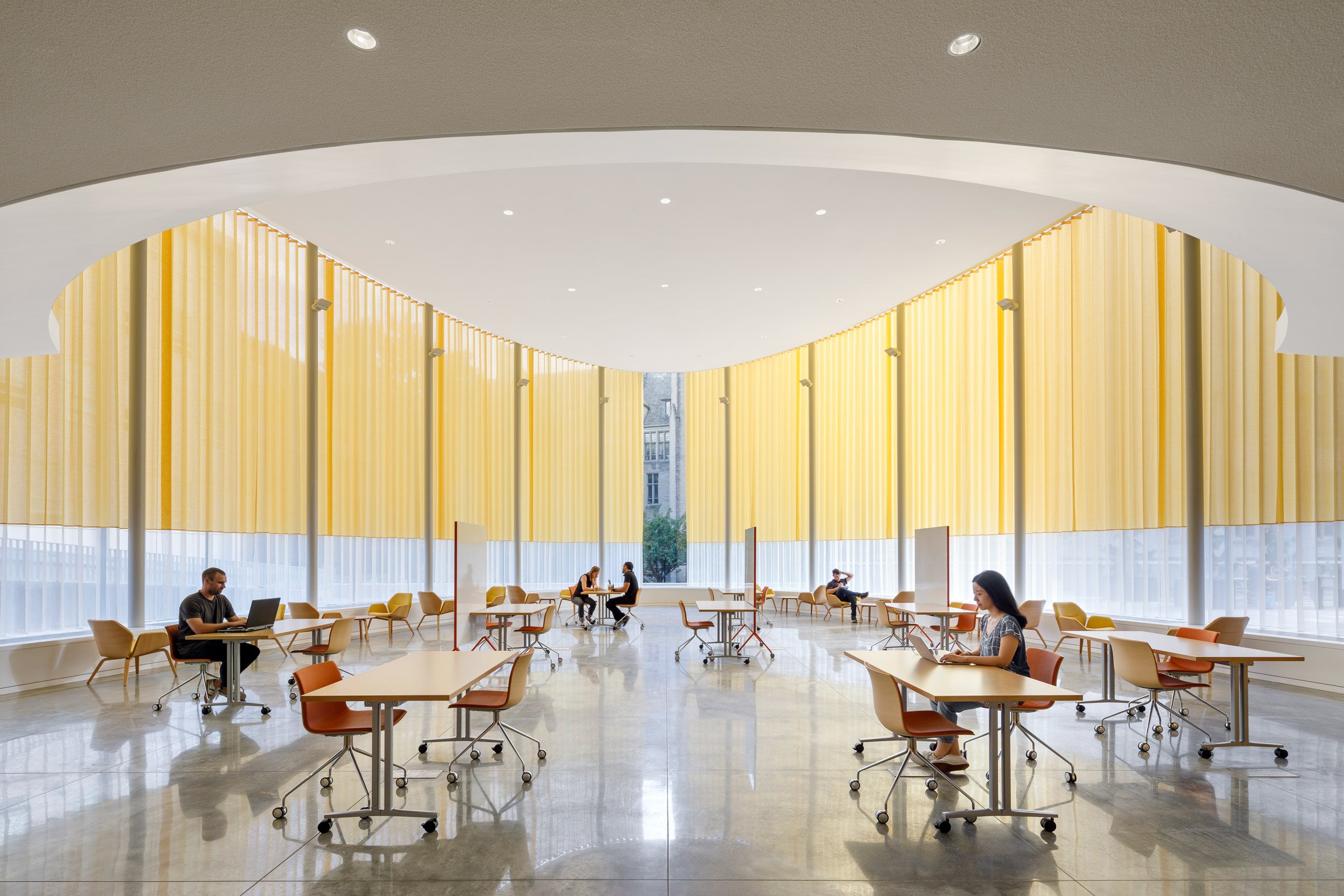 Curtains shade glass walls of pavilion by Weiss/Manfredi