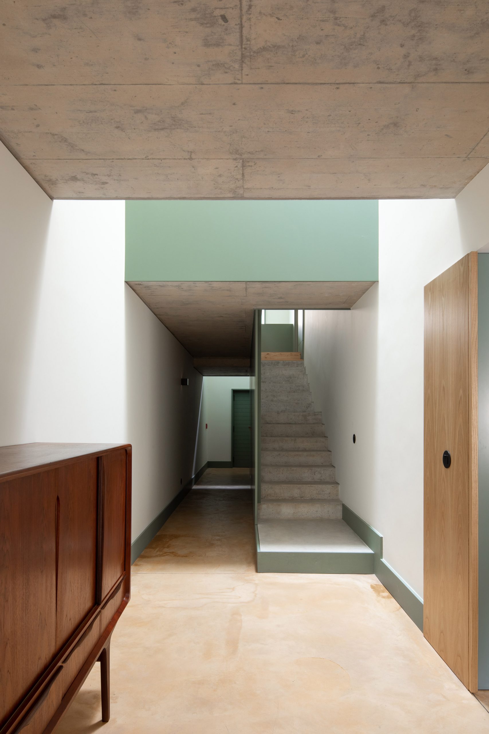 The floors have an ochre hue by depA Architects 