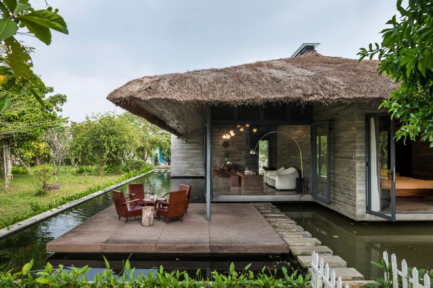 A holiday home with a thatched roof