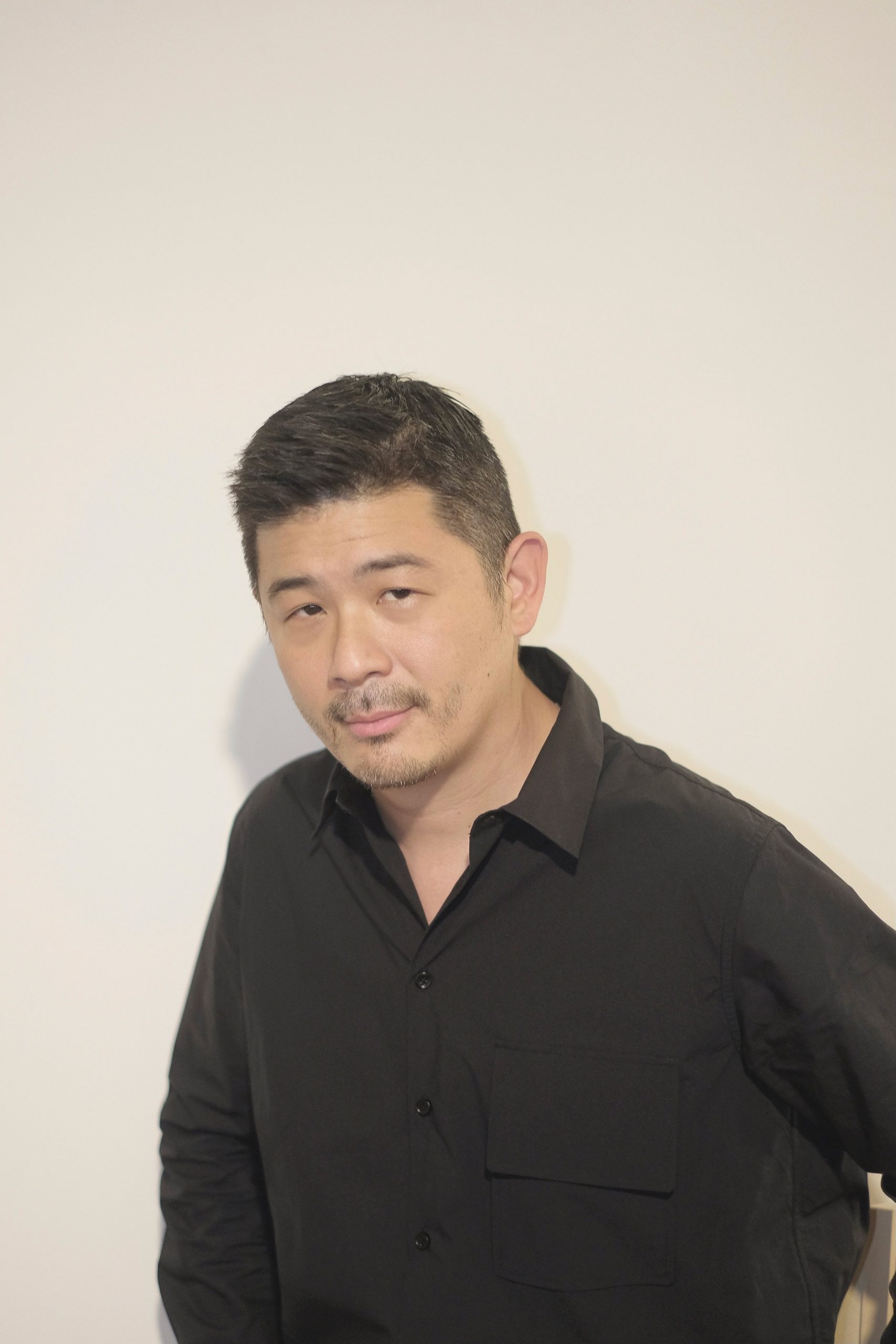 Curator Aric Chen