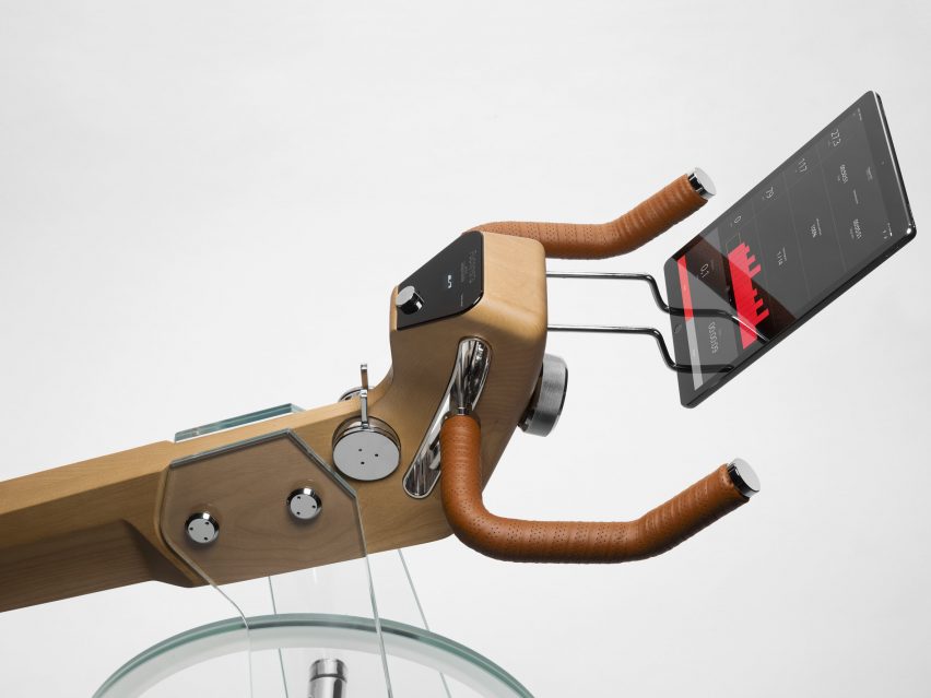 Close-up of exercise bike with leather handles and smart screen by Elite