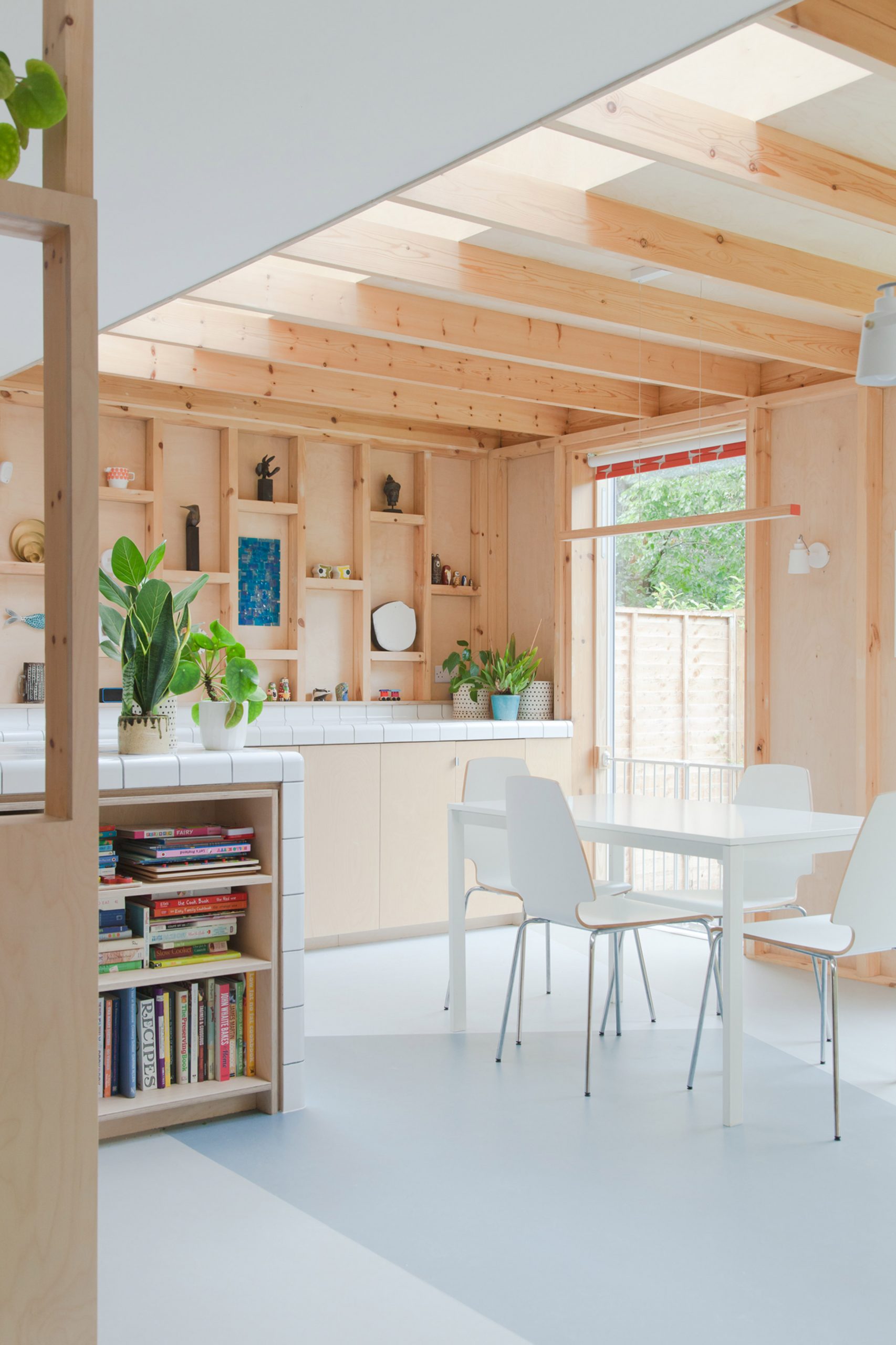 A kitchen with an exposed wooden structure