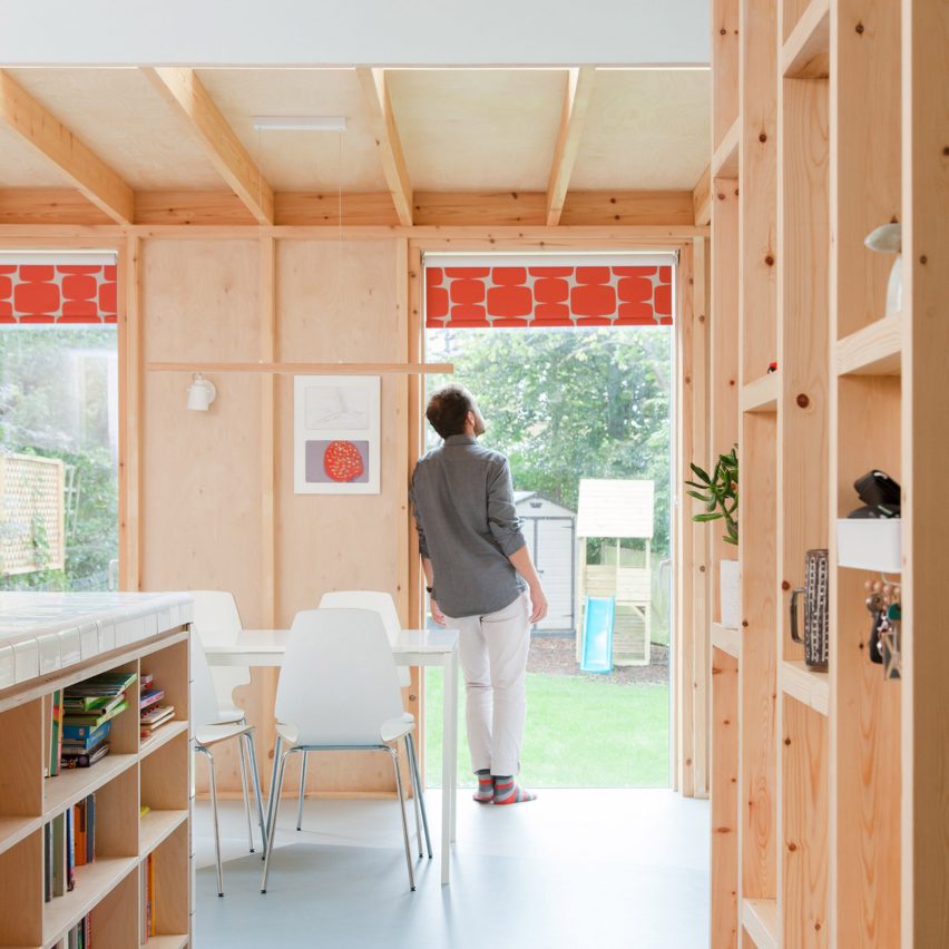 A kitchen with a wooden structure