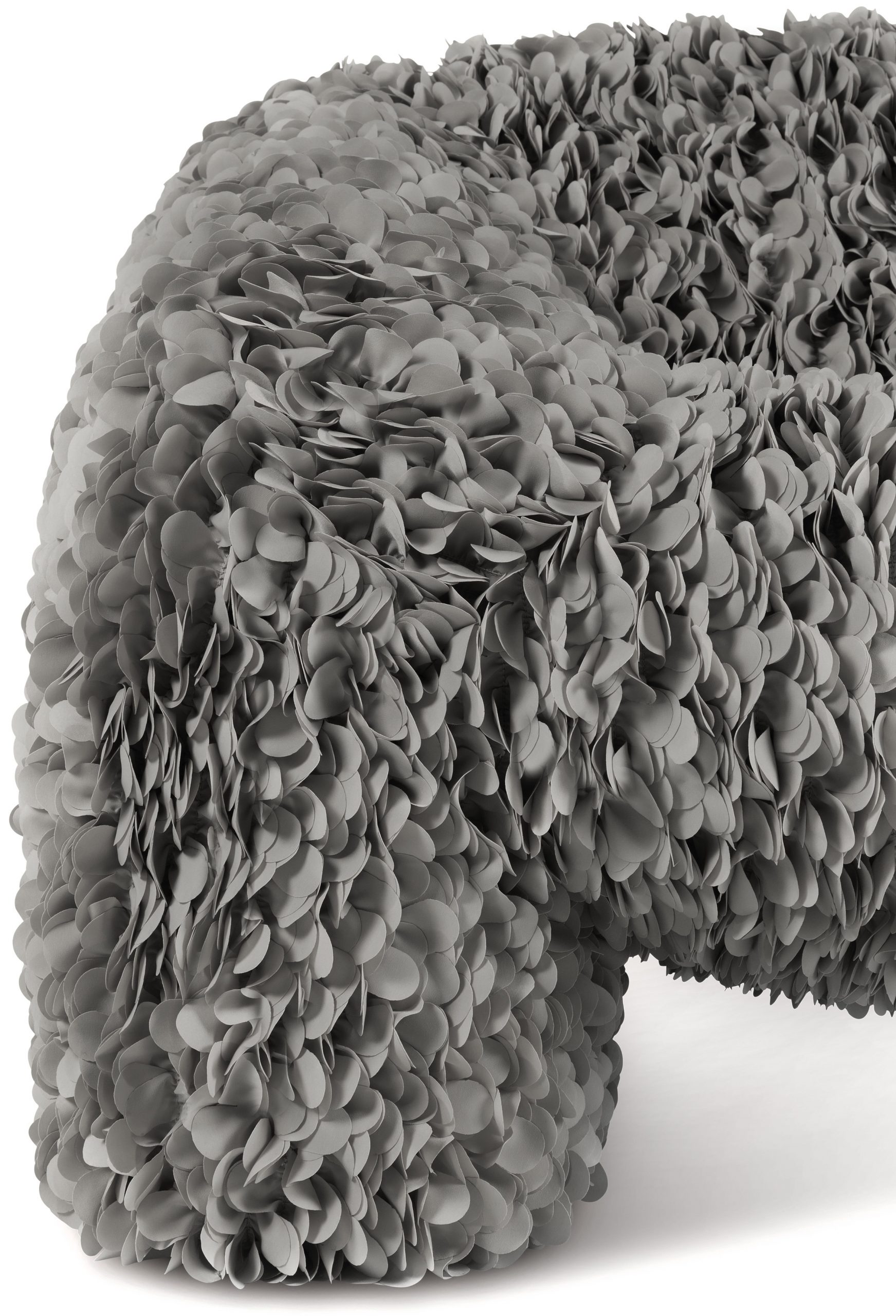 Close-up of grey petals on chair designed by Andrés Reisinger and Júlia Esqué for MoooiModules of 40 petals are sewn onto a backing textile