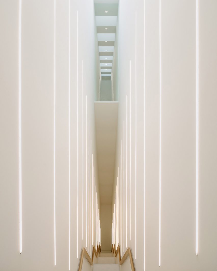 Tall stairwell with LEG lights in museum extension by Kaan Architecten