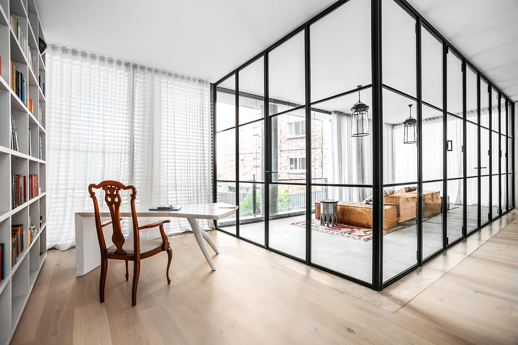 Steel and glass room within a room