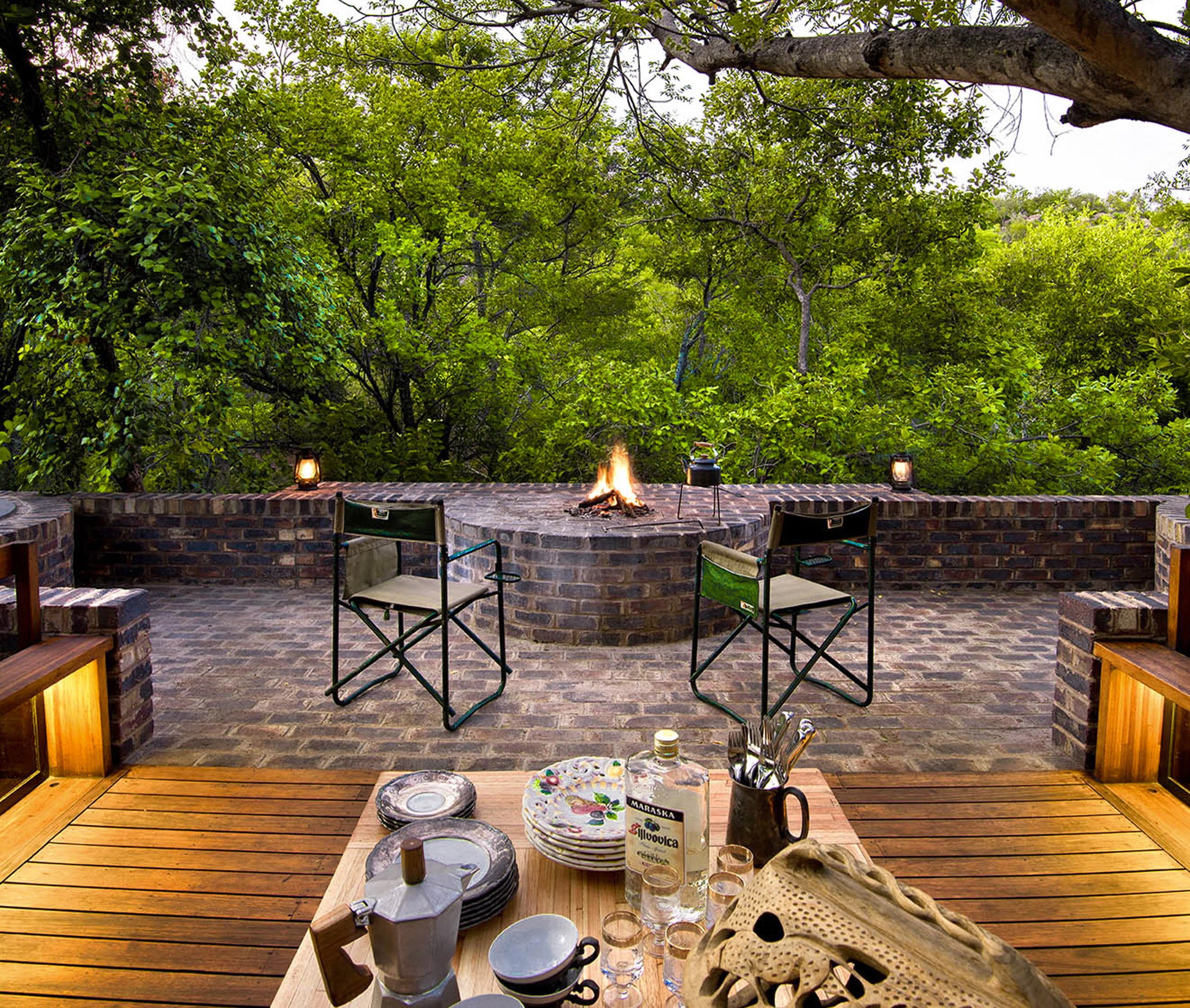 Outdoor fire place in jungle home