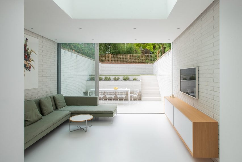 View from the interior out to the sunken garden by Moxon Architects