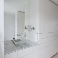 The ensuite has a large vanity