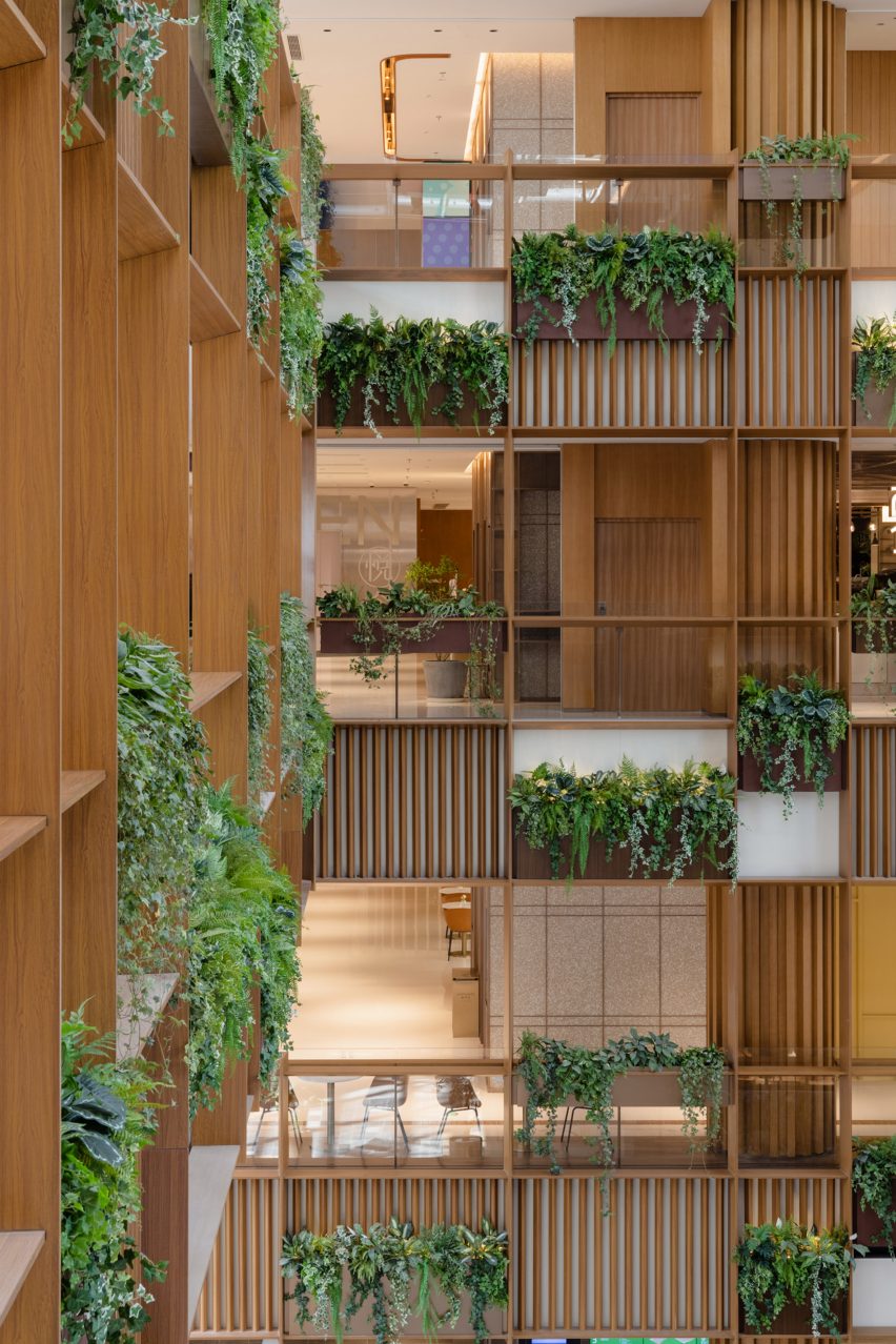 Hanging plants in Xintiandi atrium by AIM Architecture