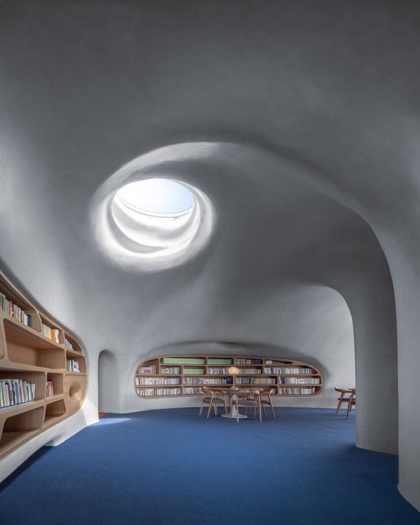 A library lit by a circular skylight
