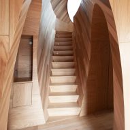 A wooden staircase and hallway