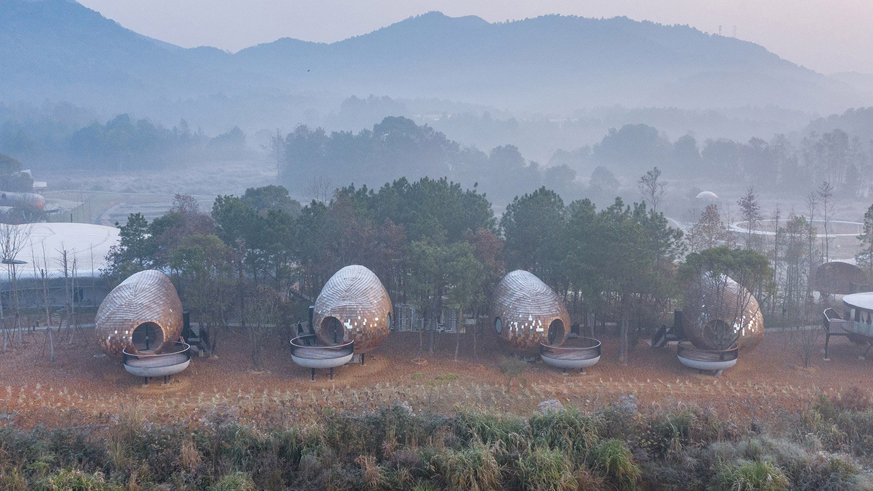 The Mushroom by ZJJZ is a cone-shaped guest house in the woods of