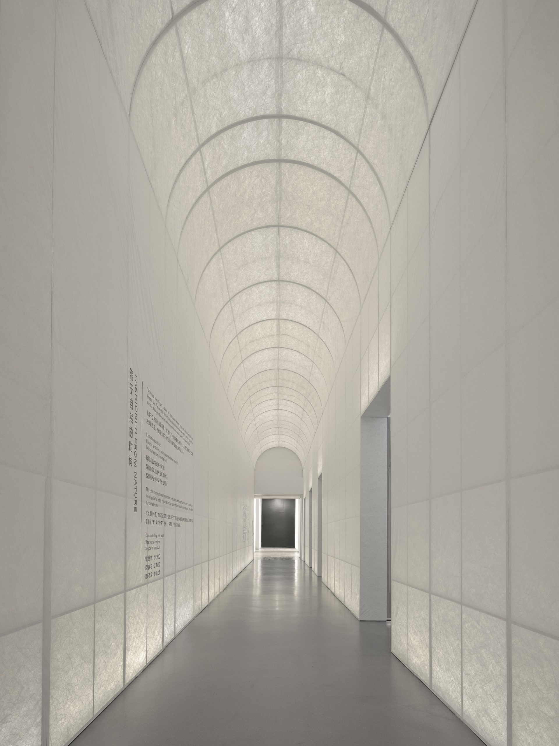 A long fabric corridor marks the entrance by Studio 10