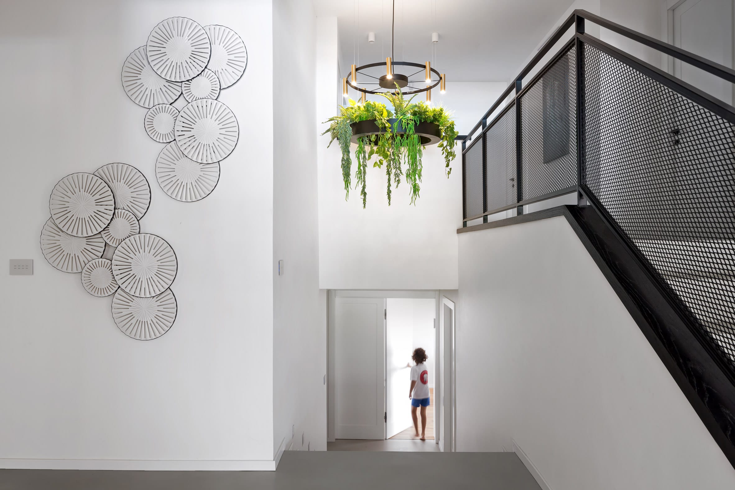 Foyer with contemporary chandelier