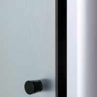Small door handle on glass door