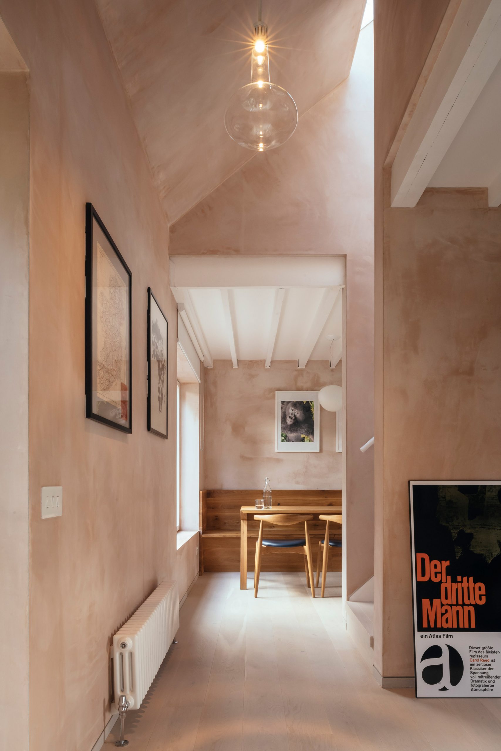 A home interior with pink plaster walls