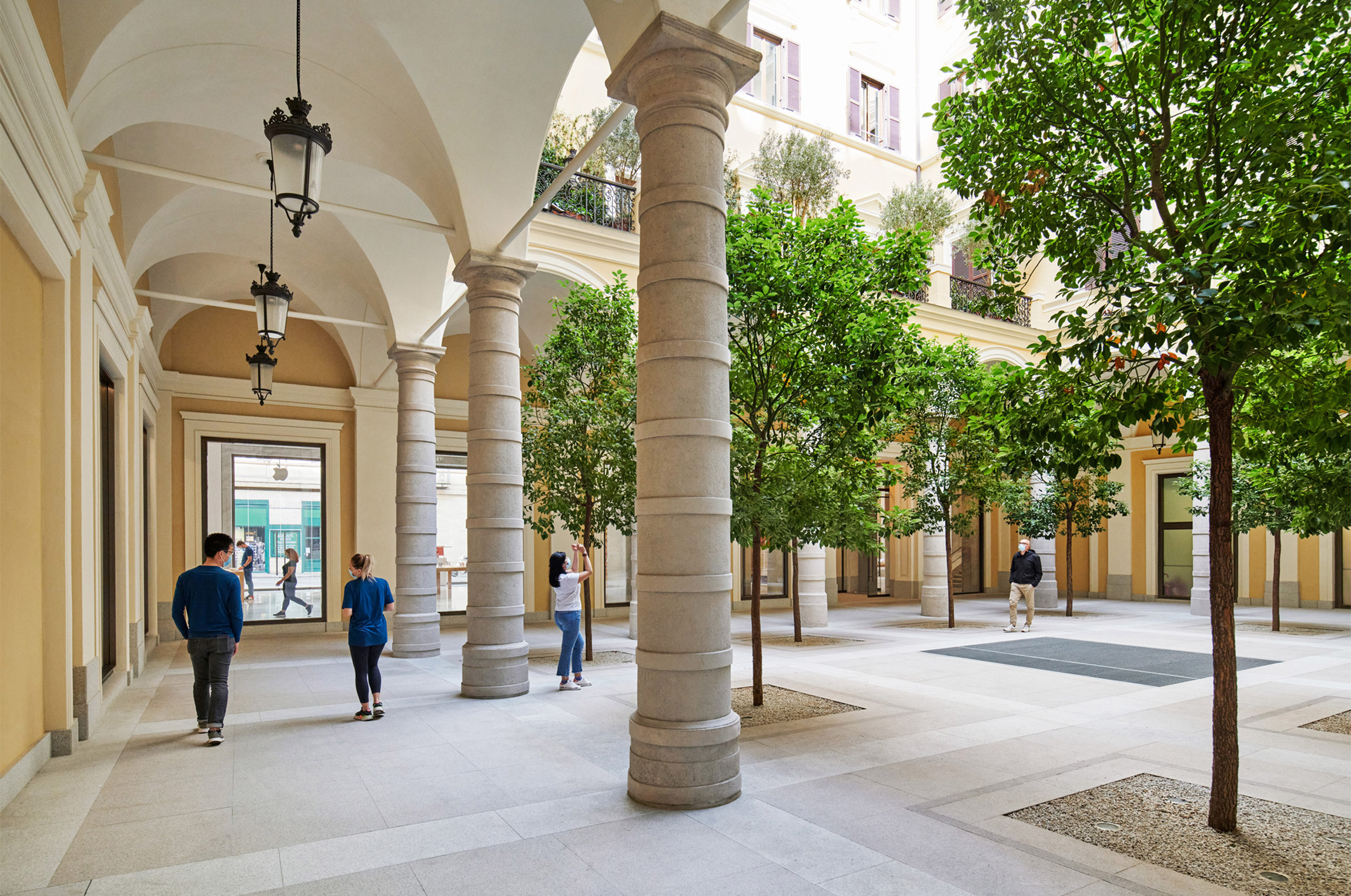 The courtyard of the Apple Via del Corso contains local trees